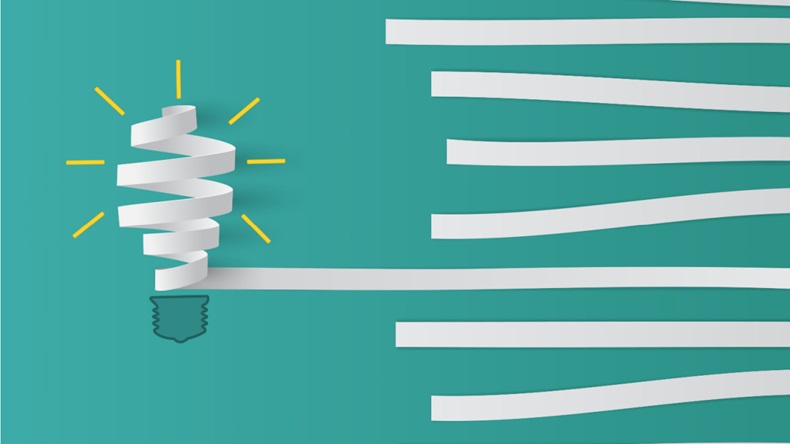 leadership in innovation represented by paper and a lightbulb 