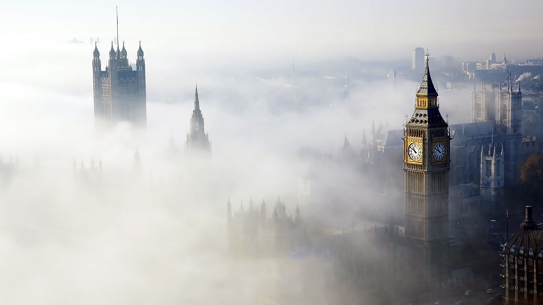 Palace of Westminster in fog, bird's eye view, seen from the sky 