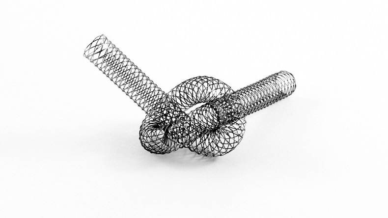 braided nitinol self-expanding stent shaped into a knot