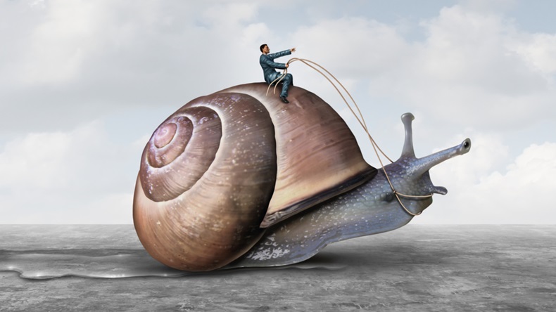 Illustration of a businessman riding a slow snail. 