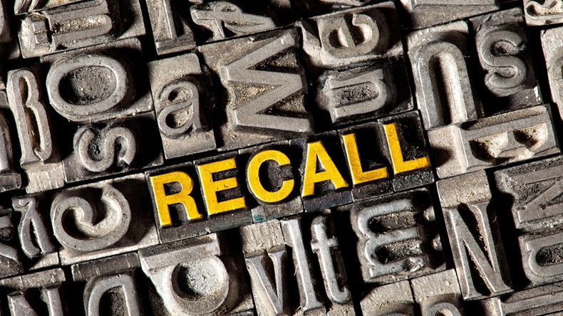 Old lead letters forming the word RECALL