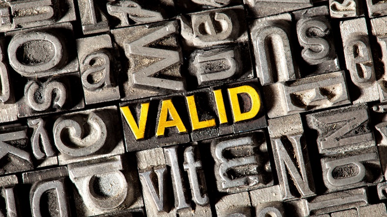 Old lead letters forming the word Valid.