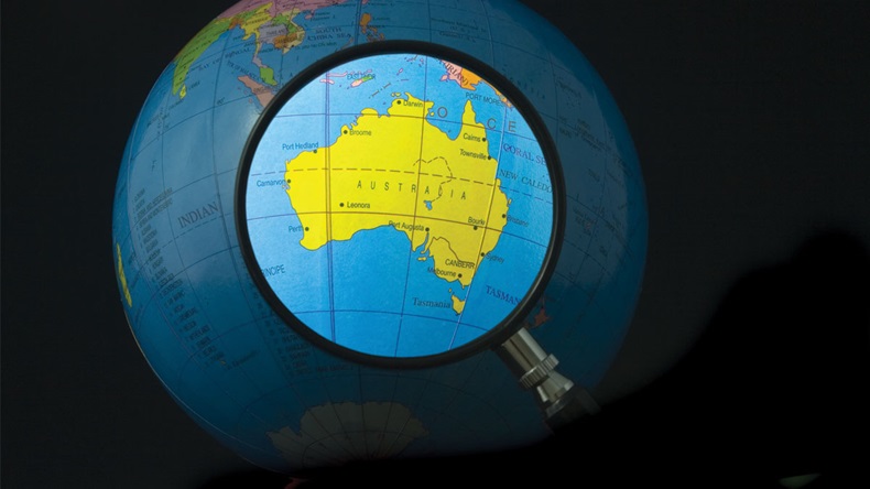 Magnifying glass focusing on Australia